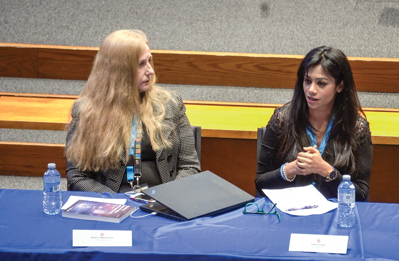 Leena Sultan (right), a former Pathway of Hope participant, shares her experiences at the forum